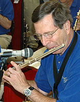 Bill plays the flute.
