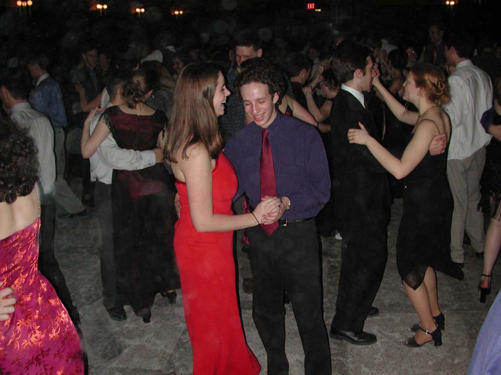 Students and faculty laugh, grin, and dance.