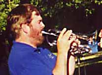 Glen plays a silver shepard's-crook cornet
