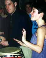 Carleton College student volunteer percussionists played along with the band in February 2000. Bigger picture is 21K.