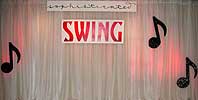 wall display: "Sophisticated Swing" in front of the curtains