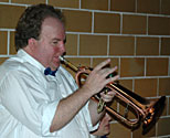 Jeff plays a gold brass flugelhorn.