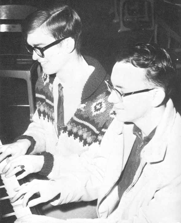 In this black-and-white photo, Glen and Dick play a duet at the keyboard.