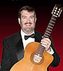 Glen performs on both classical guitar (shown) and steel-string guitar.