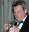 John plays trumpet