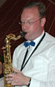 Chris plays tenor sax