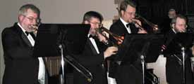 John, Glen, and Doug play tenor trombones; Don plays bass trombone.