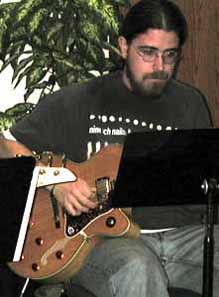 Nick Johnson plays his Epiphone guitar.