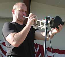Dan Kuch practices his trumpet solo on "Red House".