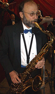 Ira stands to solo on tenor sax.