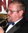 Gene plays trumpet