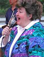 Barb belts out a song.