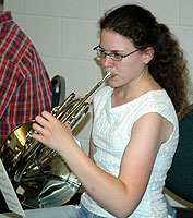 Bridget plays horn.
