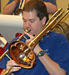 Garrett plays bass trombone